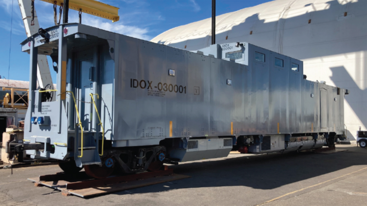 The Rail Escort Vehicle (pictured) was designed in accordance with Association of American Railroads Standard S-2043 for trains used to transport spent nuclear fuel and high-level radioactive waste.