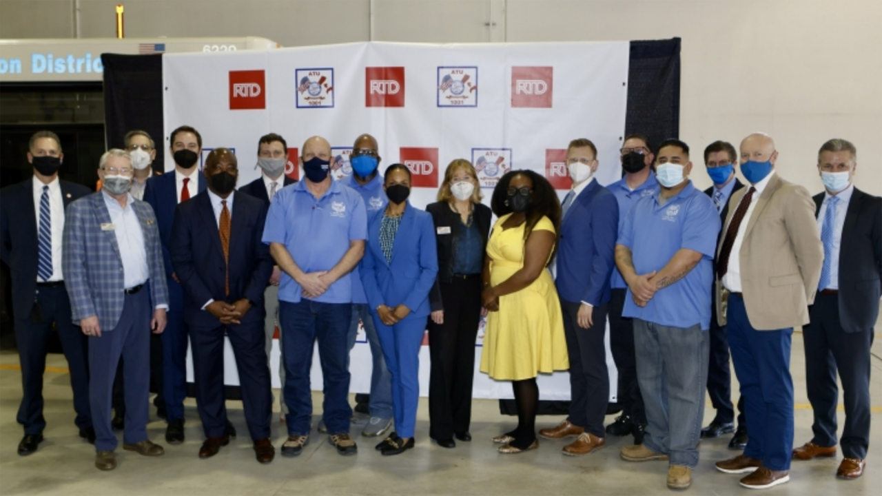 The Board of Directors at Denver RTD has authorized the agency’s General Manager and CEO Debra A. Johnson (pictured ninth from left) to enter into a successor three-year collective bargaining agreement with the Amalgamated Transit Union Local 1001, which represents two-thirds of RTD employees.