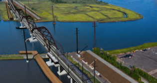 Portal North—part of the massive Gateway Program, which will eventually double rail capacity between Newark, N.J., and New York—will replace the 110-year-old Portal Bridge, a mechanical-trouble-plagued swing bridge built by the Pennsylvania Railroad in 1910 as part of its New York Improvements project.