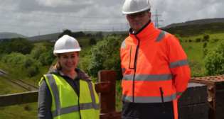 Pictured: MxV Rail President and CEO Kari Gonzales and GCRE Chief Executive Simon Jones. (Photograph Courtesy of MxV Rail and GCRE)