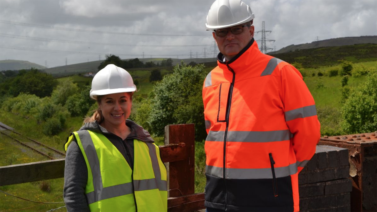Pictured: MxV Rail President and CEO Kari Gonzales and GCRE Chief Executive Simon Jones. (Photograph Courtesy of MxV Rail and GCRE)
