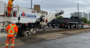 A closer look at asphalt milling, a process that reuses asphalt material. (Photograph and Caption Courtesy of Metrolinx)
