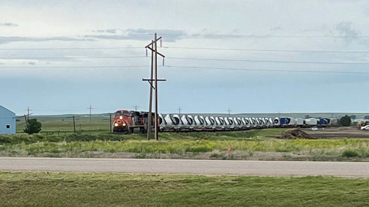 Pictured: The first of 11 CN trains hauling wind turbine units to Oyen, Alberta. (Photograph Courtesy of CN)