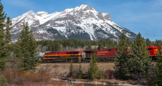 KCS and CP locomotives at the top of the westbound grade at the Continental Divide in Crowsnest Pass, Alberta. Photo by David Duffin