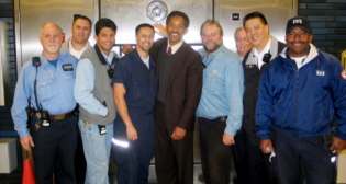Actor Will Smith with BART employees on-set of “The Pursuit of Happyness” in 2005. (Caption and Photograph Courtesy of BART)