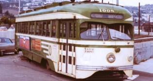 This photo taken in the mid 1970s shows the “green and cream wings” livery once worn by hundreds of Muni vehicles. This car was delivered to Muni in 1948 and still operates today. (Caption and Photograph Courtesy of Muni)