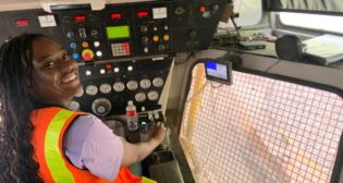 During a trip to Fort Worth, summer intern Mariam Okunubi had a chance to see what it's like behind the controls of a ballast undercutter.