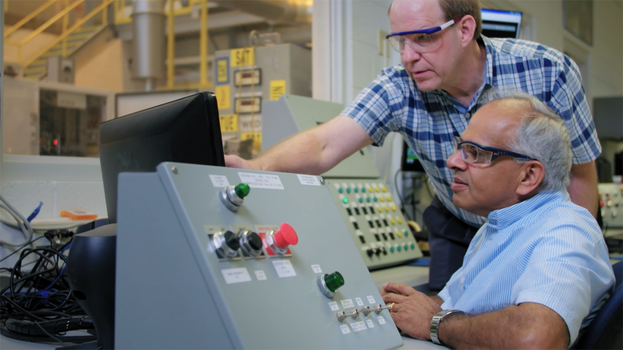 AJ Kumar (seated) joined GE Transportation—now Wabtec—in 1977, and recently earned his 362nd patent. (Photograph Courtesy of Wabtec)