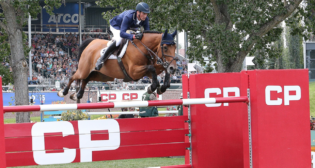 Daniel Deusser jumped three clear rounds to win the $3 million CP International Grand Prix at Spruce Meadows in Alberta. (Photograph Courtesy of CP; (c) Spruce Meadows Media/Jack Cusano.)