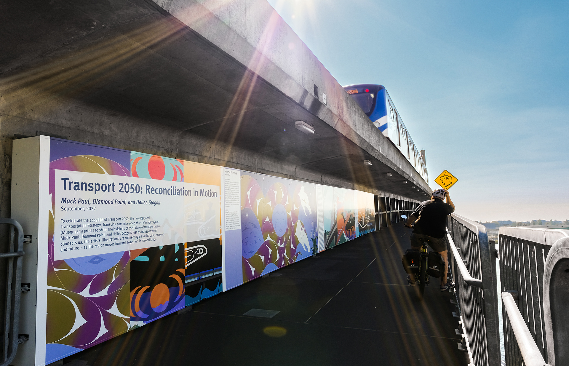 TransLink’s mural installation on a section of the Canada Line Bridge showcases designs from three xʷməθkʷəy̓əm (Musqueam Indian Band) artists. (Photograph Courtesy of TransLink)