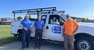 Left to right: John Penfield, The Bluegrass Railroad Museum Executive Director; William Downey R. J. Corman, Railroad Group Director - Government Affairs; and Steven Walker, The Bluegrass Railroad Museum Board Member and Volunteer.