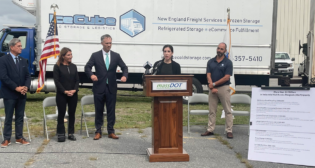 MassDOT on Sept. 8 tweeted: “Rail and Transit Administrator Slesinger joined @MassLtGov Polito [Lieutenant Governor Karyn Polito] in #NewBedford today to announce 3Mil in Industrial Rail Access (IRAP) Grants. These grants will help boost industrial rail freight access, jobs, and expand rail service.” (Photograph Courtesy of MassDOT via Twitter)