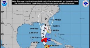 Coastal Watches/Warnings and Forecast Cone for Storm Center. (NS)