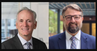 Paul Wiedefeld, Northeast Region Transportation Director, HDR (left) and Chris Dillon, Vice President, Government Affairs, North Carolina Railroad Company.