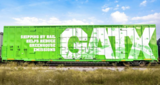 “GATX is sending us a boxcar that’s green—literally. The car will be in use across our network. Keep an eye out and maybe you’ll spot it!” BNSF wrote via LinkedIn earlier this month. (Photograph Courtesy of GATX via LinkedIn)