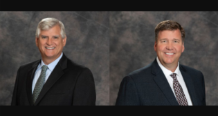 Loram’s outgoing CEO Phil Homan (left) and incoming CEO Bradley Willems.