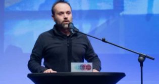 Oleksandr Petrovskyi, board member of UZ, accepting the Rail Champion award for Ukrainian Railways in recognition of its remarkable resilience and continuation of services at a time of war and hardship. Photo Credit: CER