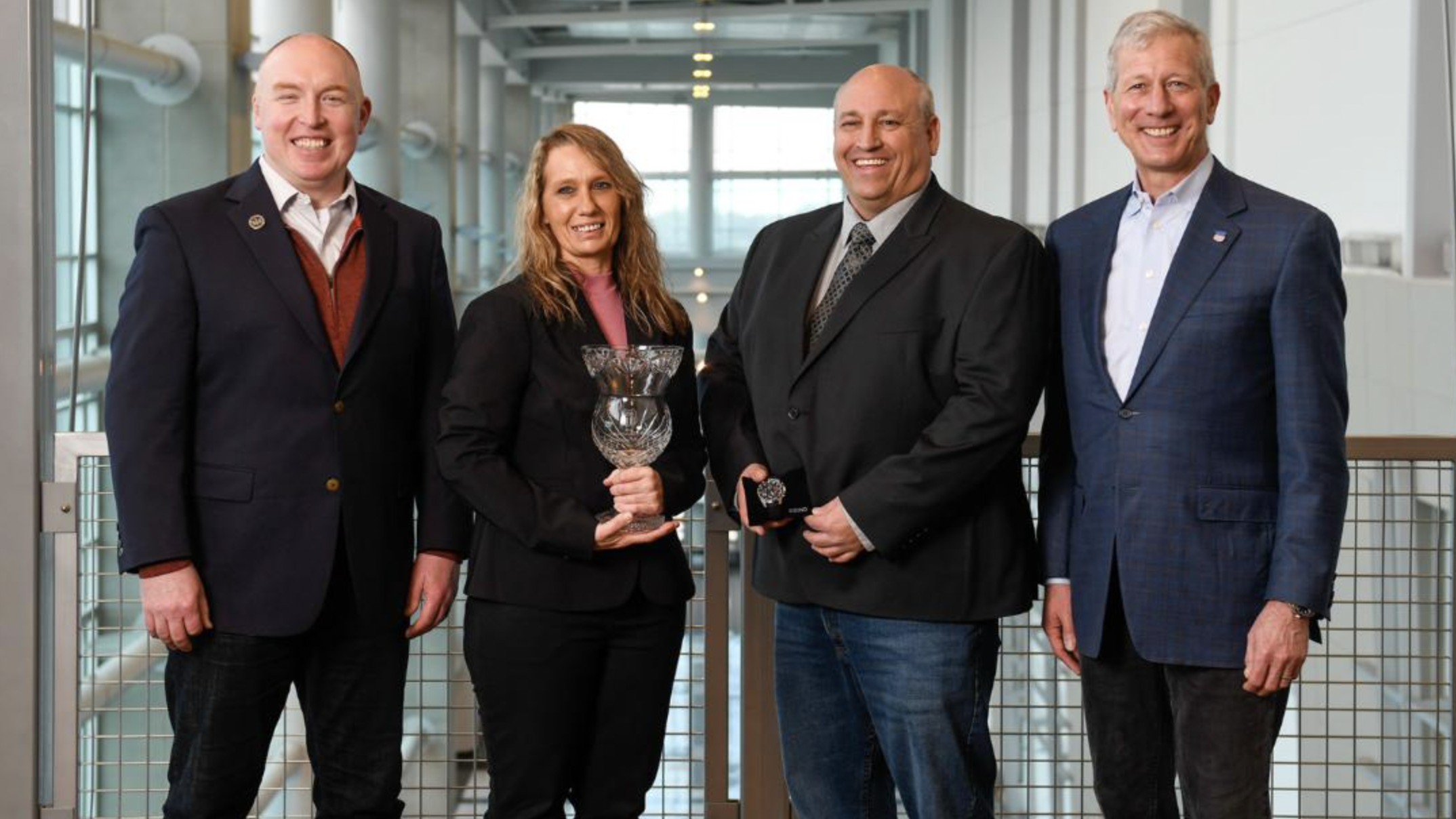 The 2022 J.C. Kenefick Safety Award winner Melissa White with, from left, Eric Gehringer, UP Executive Vice President-Operations; fellow UP employee Kent Jones; and UP Chairman, President and CEO Lance Fritz. (Caption and Photograph Courtesy of UP)