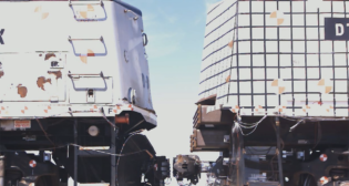 Pre-impact photo of conventional locomotive (left) and CEM locomotive (right). (Caption and Photograph Courtesy of FRA)