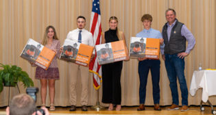 Four East Palestine High School students receive scholarships for higher education.