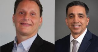 Nicholas J. Randall, COO, FreightCar America (left); and Rahul Jalali, Executive Vice President, UP (right).