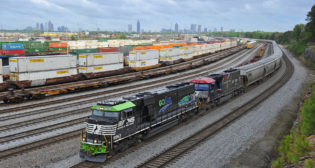 Norfolk Southern GoRail and Veterans Locomotives Pulling Covered Hoppers – Inman Yard; Atlanta, Ga. (Caption and Photograph Courtesy of Norfolk Southern)