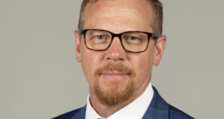 David W. Ferryman, Chief Operating Officer, Anacostia Rail Holdings