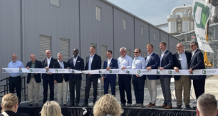 CSX’s Executive Vice President of Sales and Marketing Kevin Boone, Senior Vice President of Sales and Marketing Arthur Adams, and other Sales and Marketing employees attended the ribbon-cutting event for Heidelberg Materials’ new rail-served cement plant in Mitchell, Ind. (CSX Photograph)