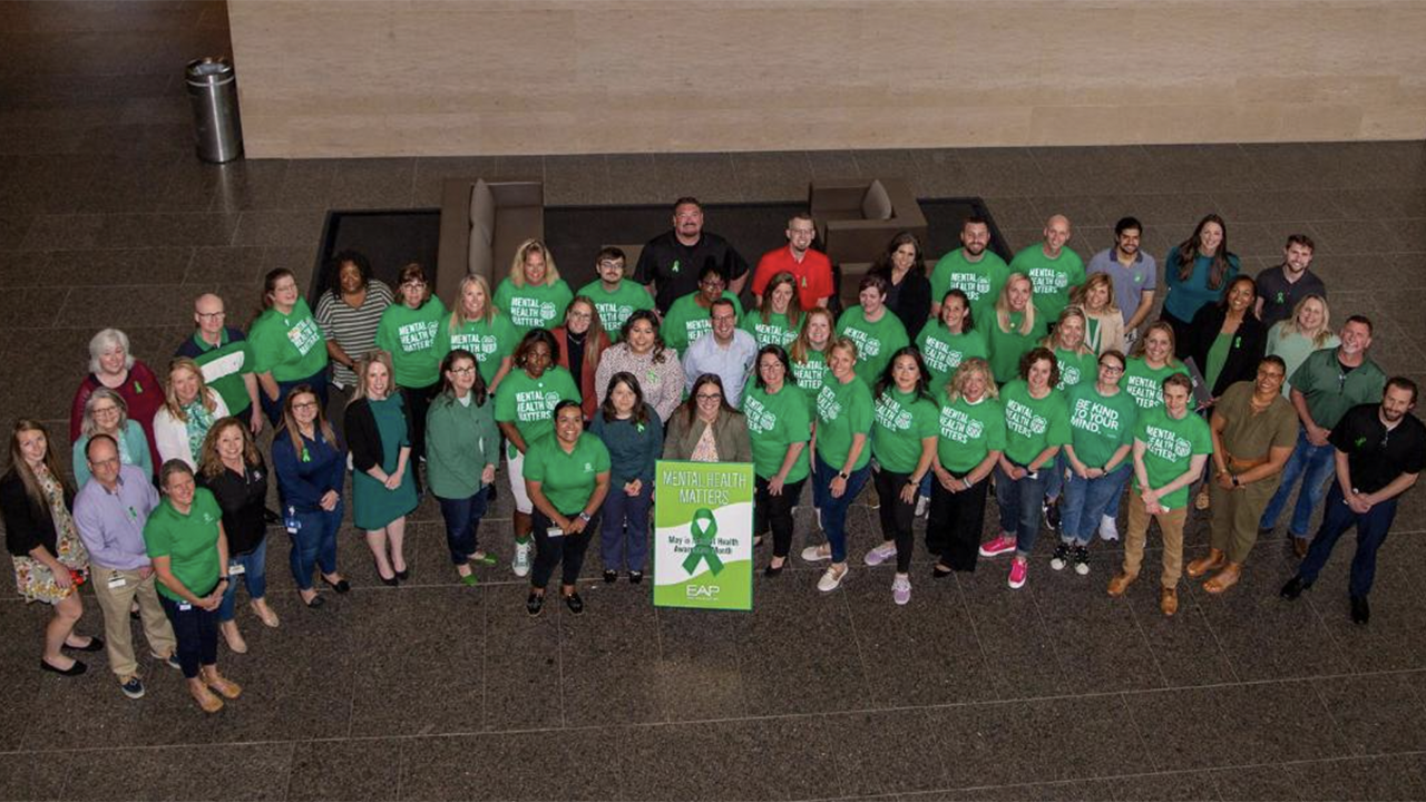 At an event held in UP Center recognizing Mental Health Awareness Month are some of the Union Pacific Workforce Resources team members who collaborated to develop new employee mental health resources and training. (Caption and Photograph Courtesy of UP)