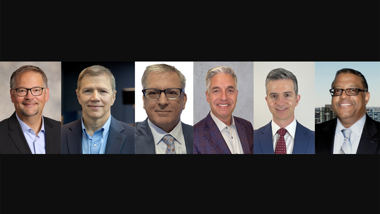 Pictured (left to right): Chad Raube, IntelliTrans; Ken Sherman, IntelliTrans; Kevin J. Hillesland, GATX; Geoffrey D. Phillips, GATX; John M. Sbragia, GATX; and Ron Ester, MBTA.