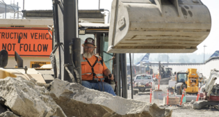 TriMet’s “A Better Red” project to completely replace the Portland International Airport MAX station and install a second track along the alignment, between the new station and Air Cargo Road, has hit its halfway mark. (TriMet Photograph)