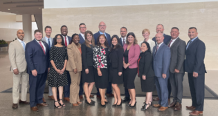 Front row, from left: John Gorman, Director, Continuous Improvement; Sudha Garikapati, Senior Director-Tech; LaKeisha Gatson-Dunham, General Director-Strategic Services; Ashley Sutera, Director-Marketing; Tonya Conley, Senior Counsel; Kate Ottoson, Director-Corporate Finance; Sarah Vogel, Senior Director-Train Management; Dao Tran-Young, Director-Crew Management Service Operations; Dan Culbertson, Senior Director-Talent Acquisition; Marco Villarreal, Superintendent-Train Operations; and Mike Shults, Superintendent-Train Operations. Back row, from left: Joshy Madathil, Senior Director, Tech; Frank Sierawski, General Director-Audit; Von Cloy, Senior Director-Equipment Distributing; John Boone, General Director-Signal; Mike Kadar, Director-Locomotive Engineering and Quality; Brian Leslie, Superintendent-Train Operations; Jacquelyn Clark, Senior Counsel; and Daniel Laudenbach, Superintendent-Train Operations.