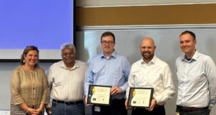 From left, UP's Kim Hess, Assistant Vice President-Energy, Marketing and Sales; Ashok Fichadia, Assistant Vice President-Customer, Tech; Kaleb Koehn; Josh Saltz; and Rick Lichtas, Assistant Vice President-Network Integration and Scheduling, Network Planning and Operations. (Union Pacific photo)