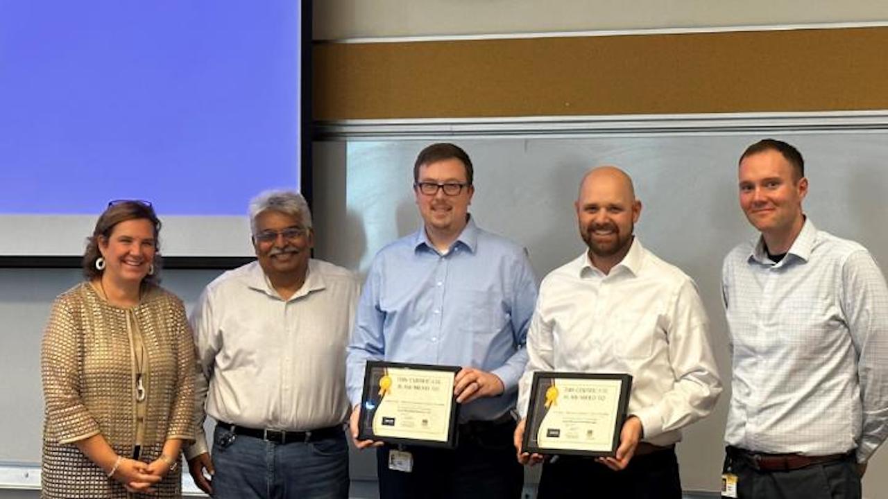 From left, UP's Kim Hess, Assistant Vice President-Energy, Marketing and Sales; Ashok Fichadia, Assistant Vice President-Customer, Tech; Kaleb Koehn; Josh Saltz; and Rick Lichtas, Assistant Vice President-Network Integration and Scheduling, Network Planning and Operations. (Union Pacific photo)