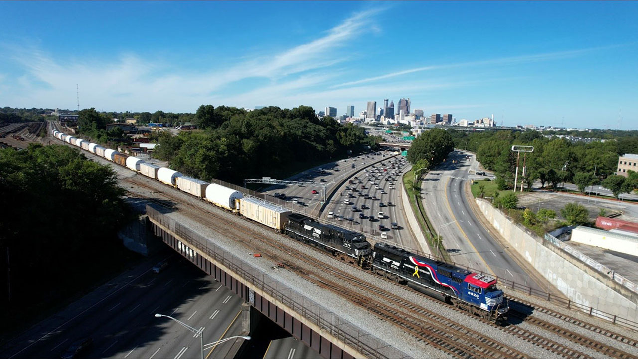 Norfolk Southern locomotives, led by 6920, the “Veterans Engine,” hauling Northrop Grumman SLS rocket components for Artemis II: Mission to the Moon through Atlanta, Ga.