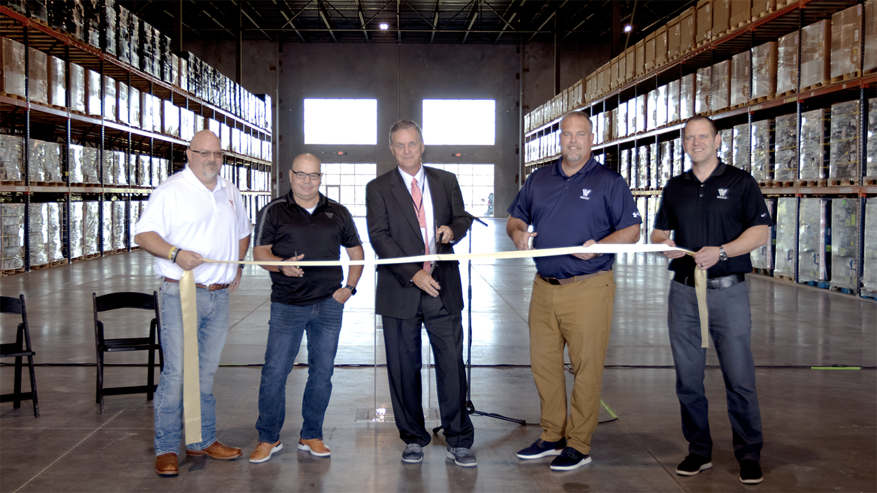 Celebrating the launch of Watco Logistics’ warehouse and logistics operating center in Springdale, Ark., were (left to right) Andy Moran, Watco Senior Director of Retail Services; Eric Wolfe, Watco Logistics President; Doug Sprouse, Springdale Mayor; Dan Smith, Watco CEO; and Nick Coomes, Watco Executive Vice President and Chief Operating Officer. (Watco Photograph)