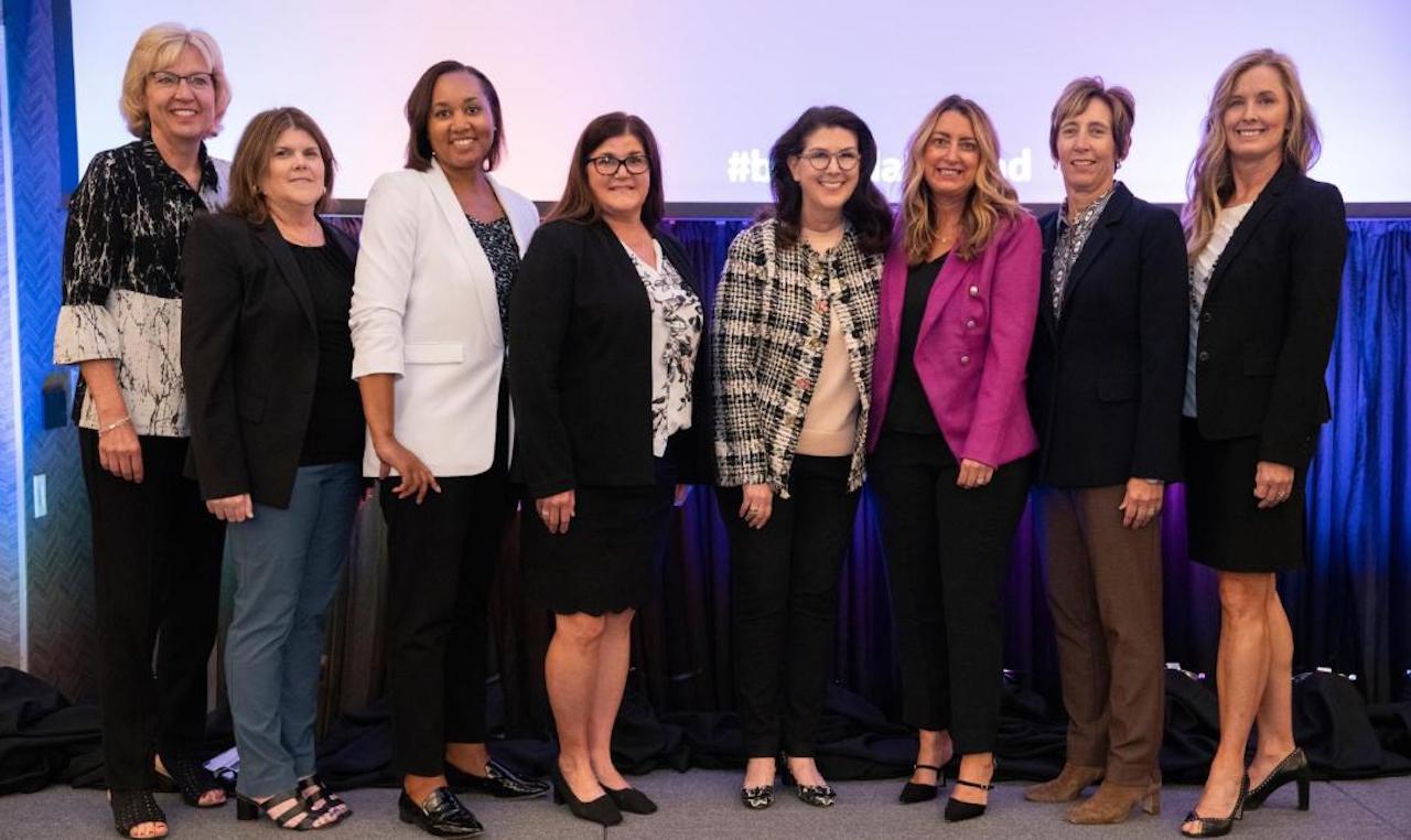 Past LEAD presidents attending the conference included, from left, Lori Loschen, general director, Marketing and Sales; Carrie Powers, assistant vice president-Financial Reporting, and current LEAD president; Polly Harris, vice president-Human Resources; Jill Bazzell Stenstrom, general director-Real Estate; Beth Whited, president; Beth Steele, general director, Marketing and Sales; Jennifer Hamann, executive vice president-Finance and chief financial officer; and Jennifer Sedlacek, senior director-Engineering Capital Budget.