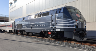 Craftsmen at MTA Metro-North Railroad’s North White Plains, N.Y., shop applied a vinyl wrap to locomotive No. 211, celebrating New York Central, the predecessor railroad that operated on the Hudson and Harlem lines. (Photo credit: Emily Moser / MTA Metro-North Railroad)