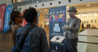Employees learned more about the Living Library during an event held last month at UP Center. (Caption and Photograph Courtesy of UP)