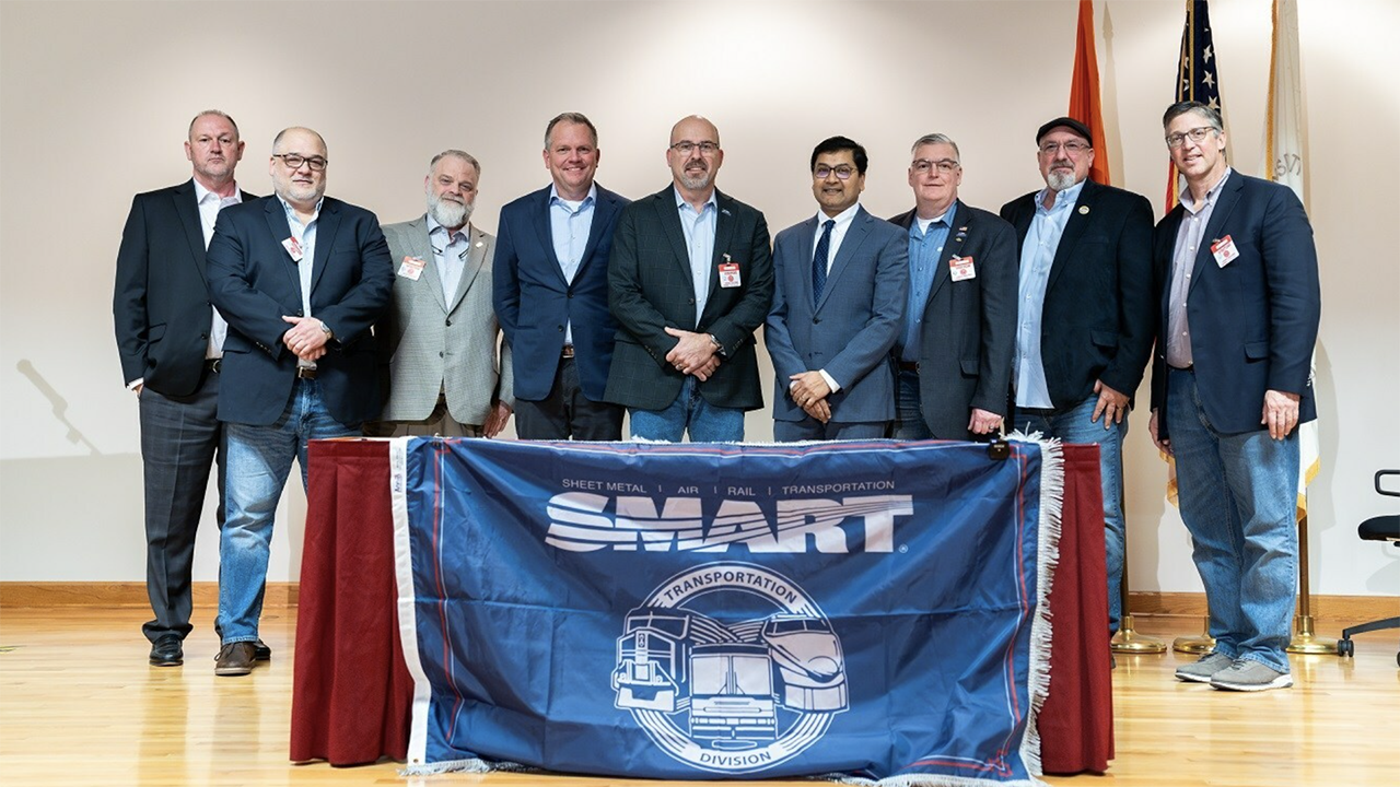NS, SMART-TD and BLET on Feb. 15 signed an agreement to participate in FRA’s Confidential Close Call Reporting System (C3RS). Pictured: SMART-TD officers flank TD President Jeremy R. Ferguson (center), NS President and CEO Alan Shaw (left of Ferguson) and FRA Administrator Amit Bose (right of Ferguson) at the signing ceremony in Atlanta. (Photograph Courtesy of SMART-TD, NS)