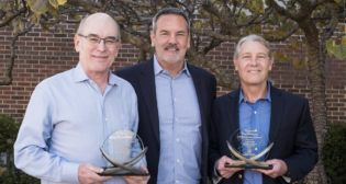 AAR’s AVP of Environment, Hazardous Materials and Climate Change Devin Sprinkle with honorees Rick Verkler of CN (left) and Mark Dudle of Norfolk Southern (right). (AAR Photograph)