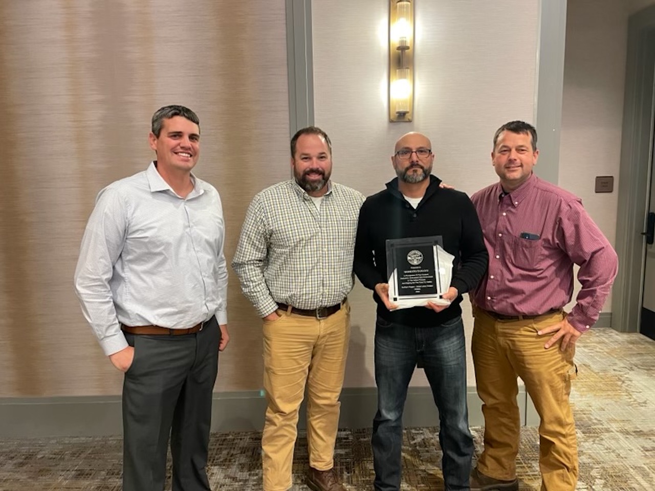 Norfolk Southern's Modesto Tamayo (second from right) was recognized for his contribution to the railroad at a ceremony in South Bend, Ind., on Nov. 2.