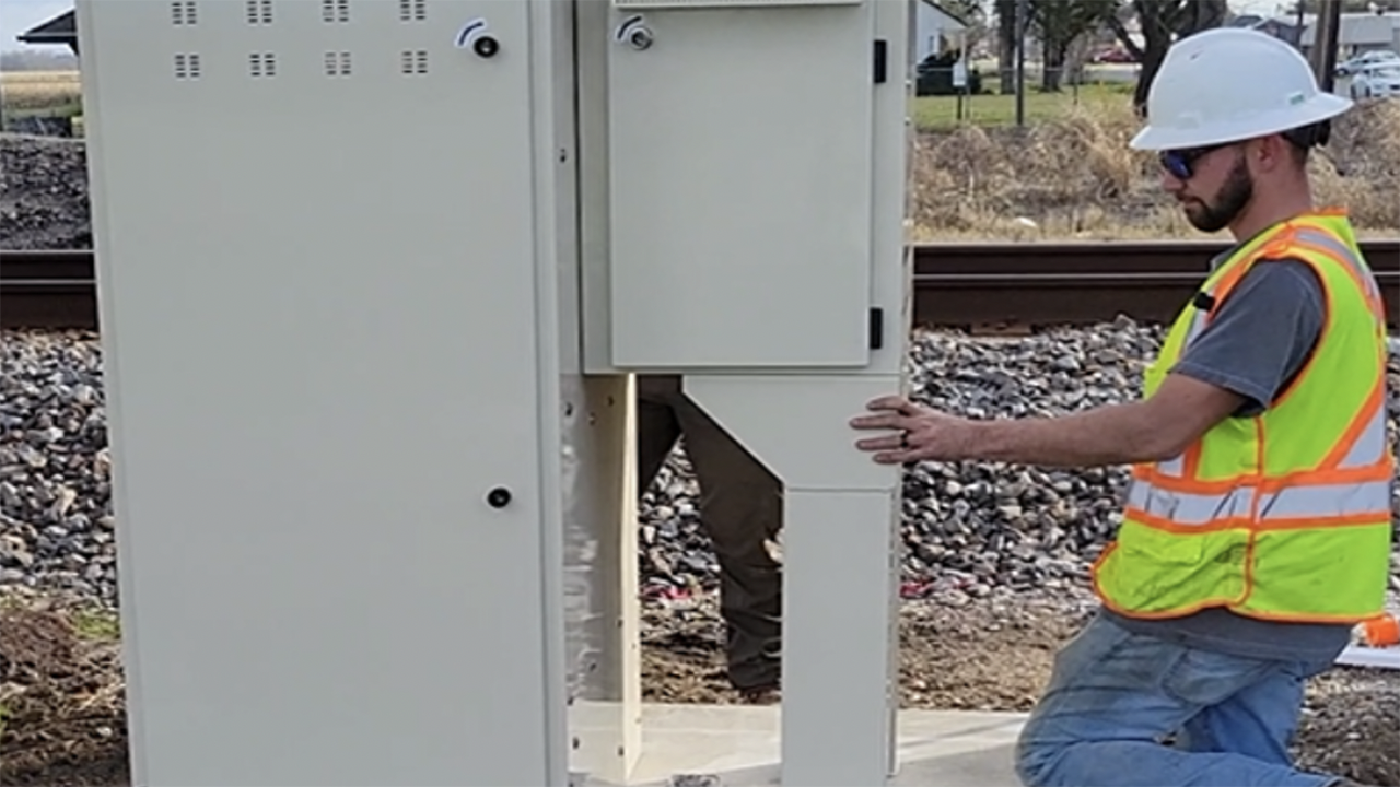 A hydrogen supplier installs a new hydrogen-powered fuel cell at a Union Pacific crossing in Louisiana. (Caption and Photograph Courtesy of UP)