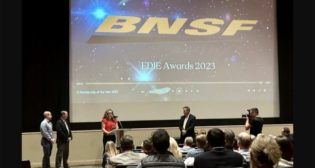 Accepting BNSF’s Partnership of the Year Award from the Economic Development Council of Colorado were Lindsay Van Meter BNSF Regional Manager, Economic Development; David Polzin BNSF Director, Economic Development; and Ryan Dwiggins, JLL Manager, Economic Development. (BNSF Photograph)