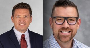 Graham Christie (left), COO, ACTA; and Jason Kaiser (right), Group President of E&T, Caterpillar.