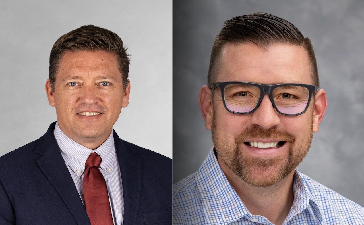 Graham Christie (left), COO, ACTA; and Jason Kaiser (right), Group President of E&T, Caterpillar.