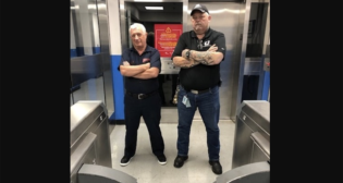 Eugene Shnayderman (left) and PATH Chief Maintenance Supervisor Charles Chipman standing guard. (PANY/NJ Photograph)