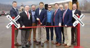 From left to right: Congresswoman Carol Miller’s Veterans Affairs Liaison Cody Sanders; Wayne County Commission President Jeff Maddox; R. J. Corman Railroad Group Vice President Commercial Development Michael Robinson; R. J. Corman Railroad Group President and CEO Ed Quinn; Wayne County Commissioner Robert Thompson; Wayne County Commissioner Travis Thompson; Delegate Mark Ross; West Virginia State Senator Robert Plymale; and R. J. Corman Railroad Group AVP Commercial Development Greg Miller. (Caption and Photograph Courtesy of R.J. Corman)