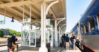 ​Passengers wait to board a Piedmont train at the station in Greensboro N.C. (NC By Train)