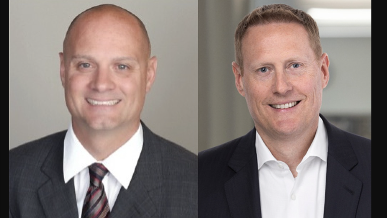 Quentin Schulte, President, Northern Lines Railway, an Anacostia Rail Holdings subsidiary (left); and Chris Statham, Chief Financial Officer, STV.